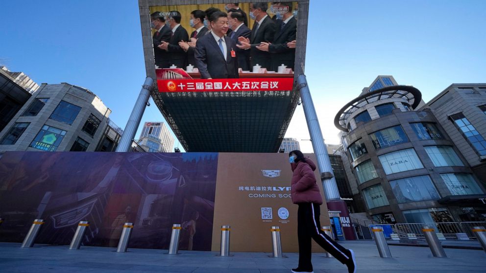 China tries to calm markets by pledging support for the economy