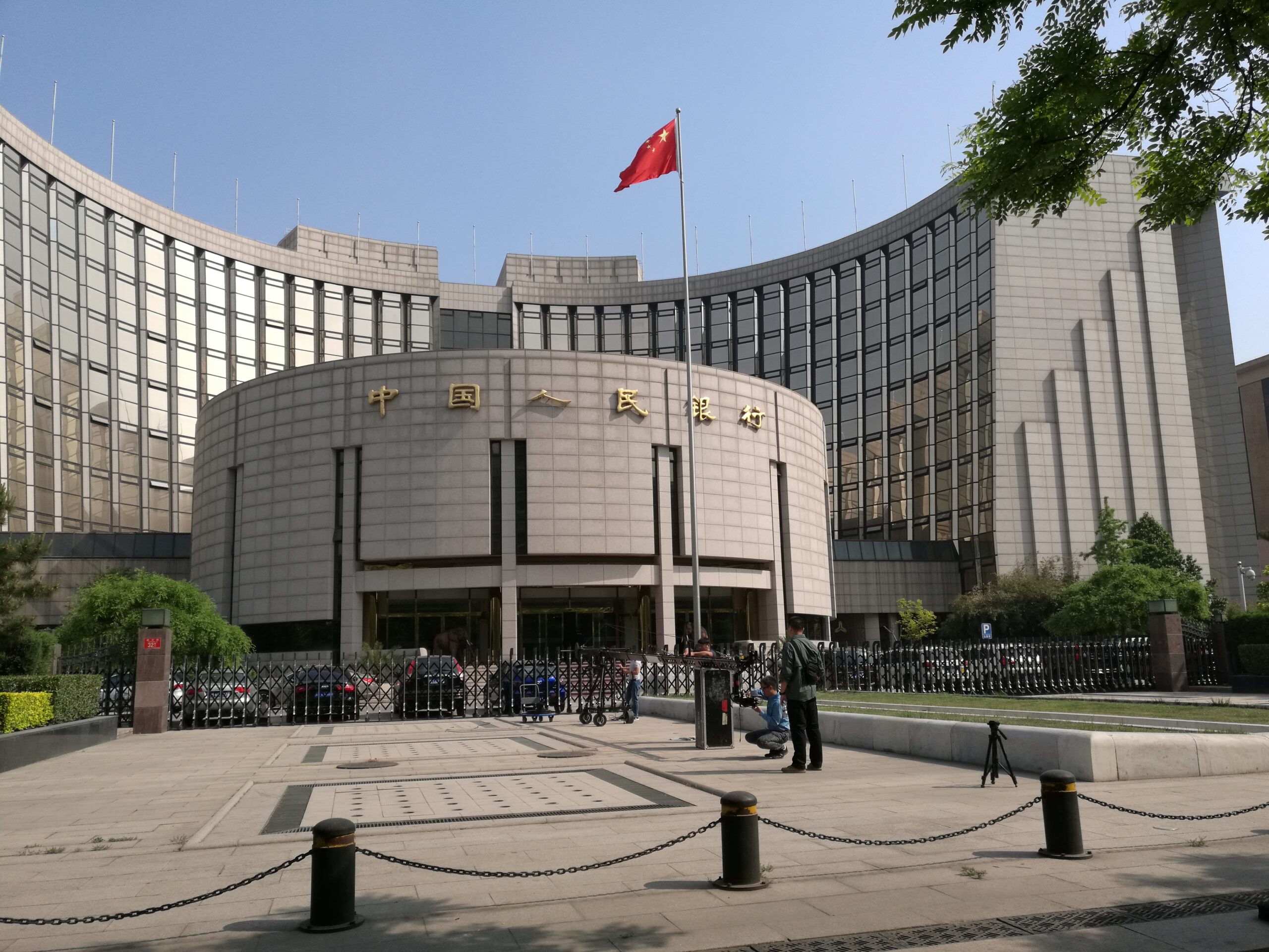 China Holds Key Lending Rates to Stabilize Yuan Amid Strong Economic Data